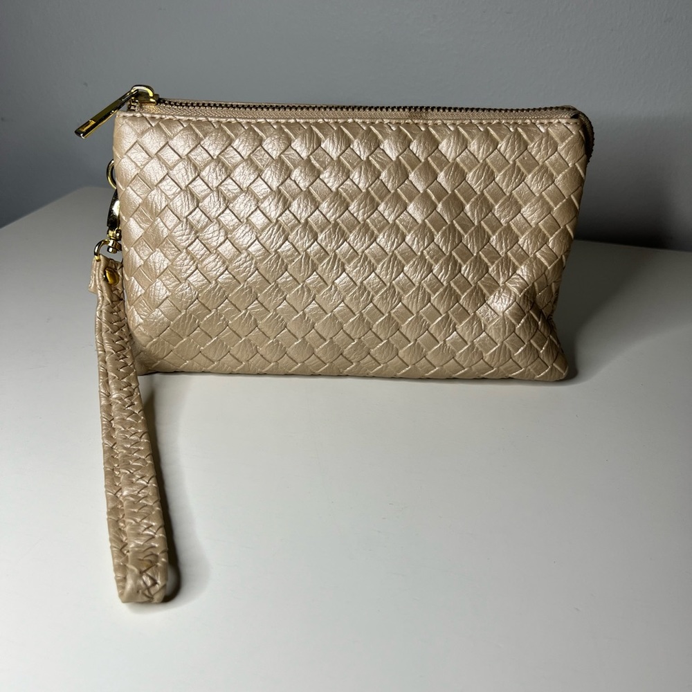 Gold colored clutch wallet
